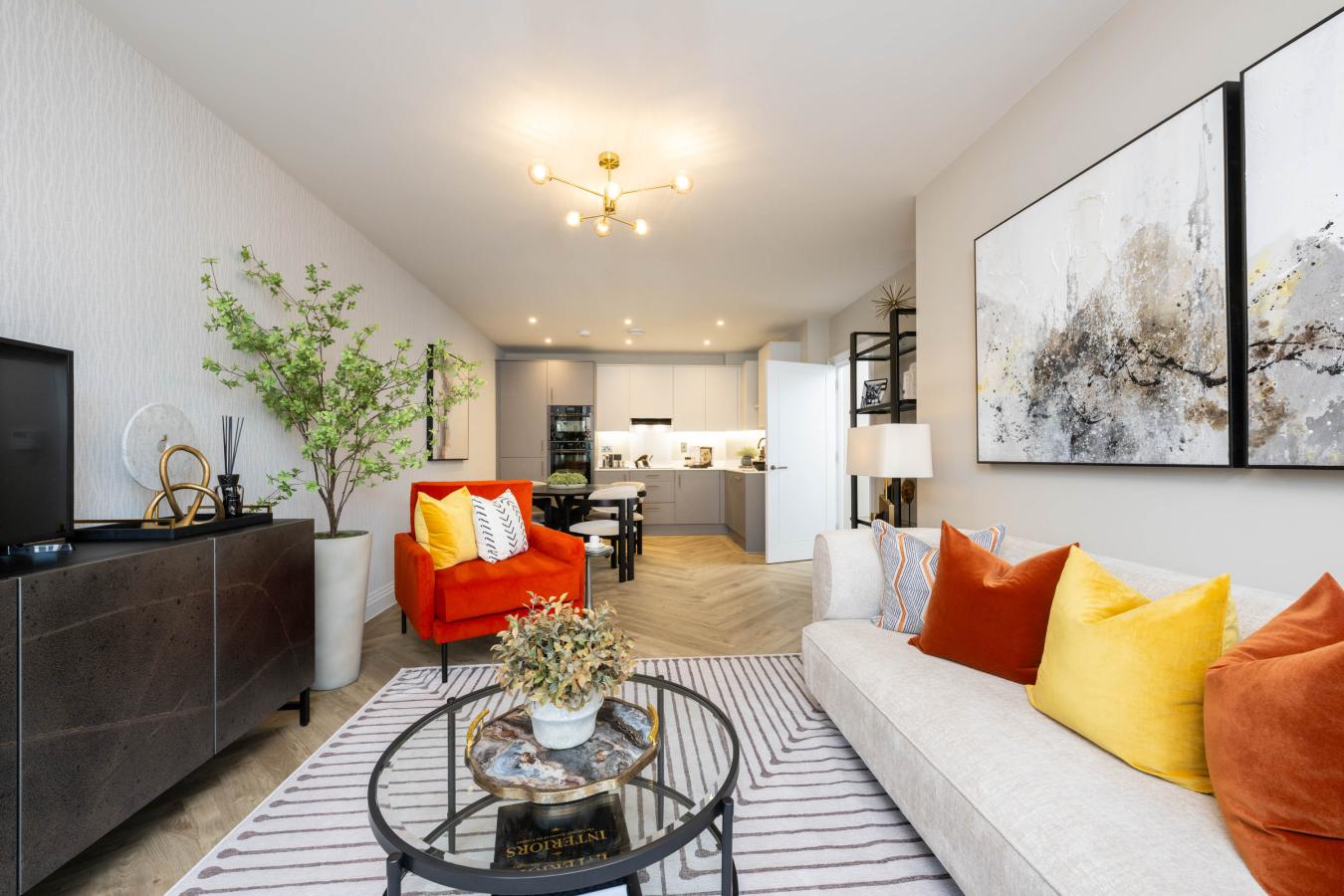 Lounge dining kitchen at show home of Oaklands Park, Esher